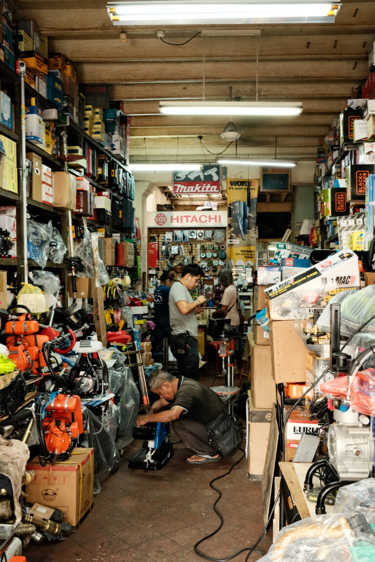 A Picture showing a stuffed Workshop with Workers in Georgetown, Malaysia